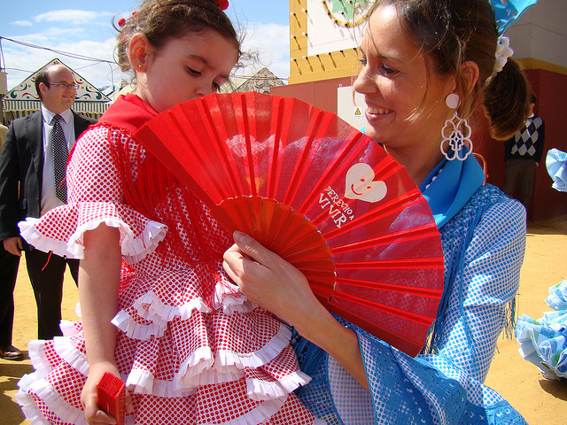 Seville April Fair: Mother Fanning Her Daughter at La Feria de Abril
